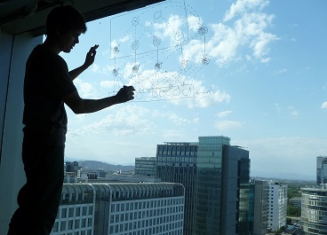 whitney writing on window with cloud in background